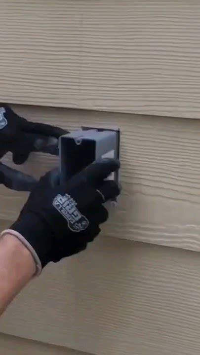 cut out the electrical boxes before our after|electrical box holes before siding.